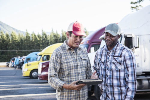 If you can do so, you could do that. However, all you should be doing is getting the driver's name, phone number, address, insurance information, and who he or she works for.